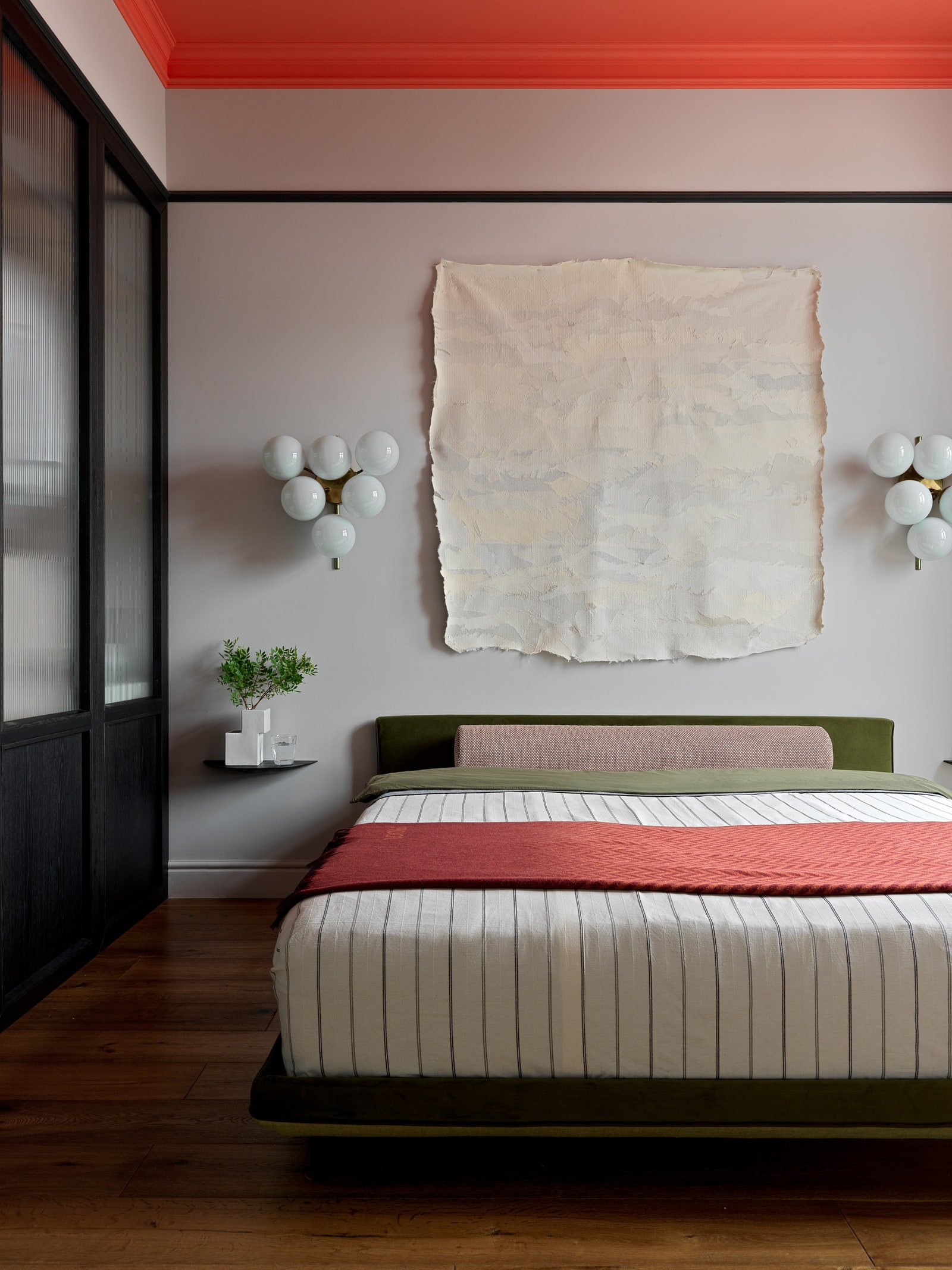 Спальня. Кровать сделана на заказ по эскизам дизайнера советские винтажные бра прикроватные полки Menu на стене работа...