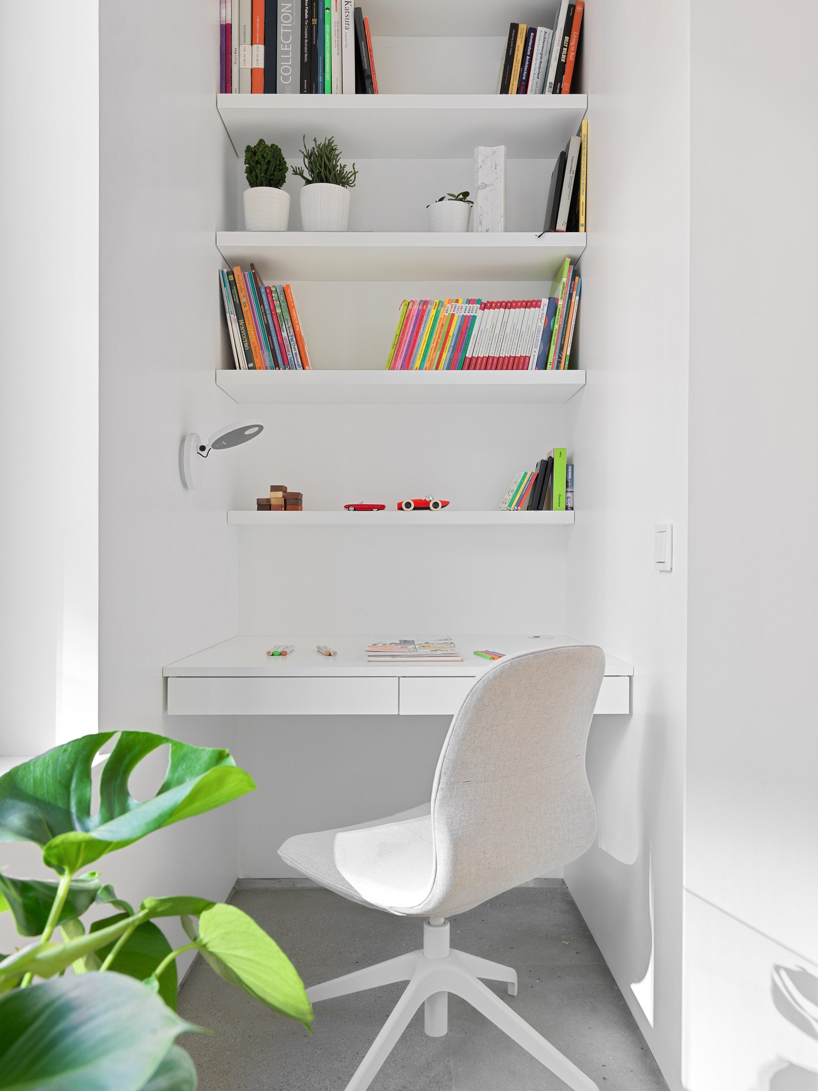 Детская комната. Стол кровать и шкафы сделаны по эскизам архитектора бра Artemide стул по дизайну Вирджила Абло для IKEA.