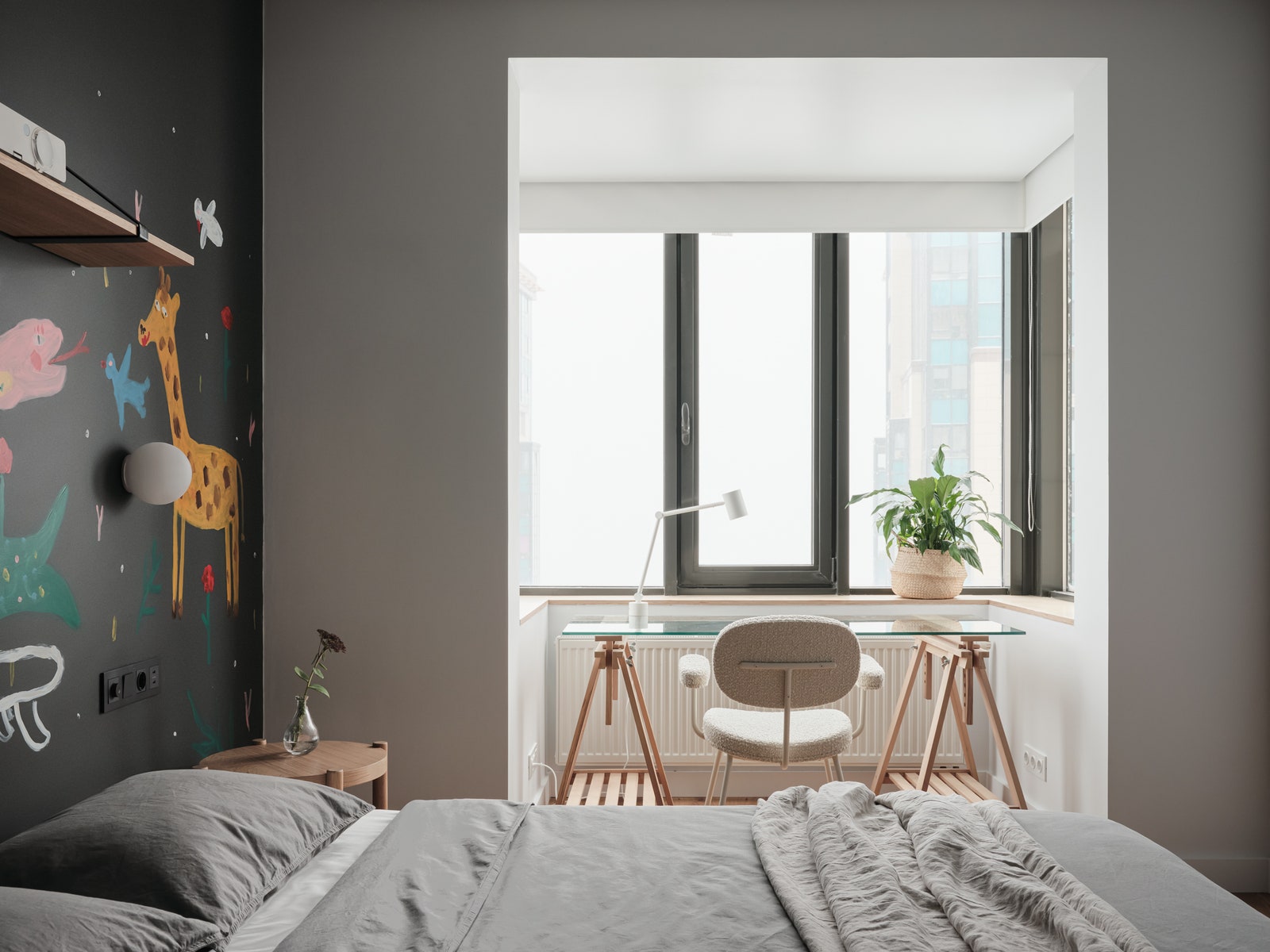 Спальня. Стол и лампа IKEA стул Delo Design на стене роспись Кирилла Бурыгина.