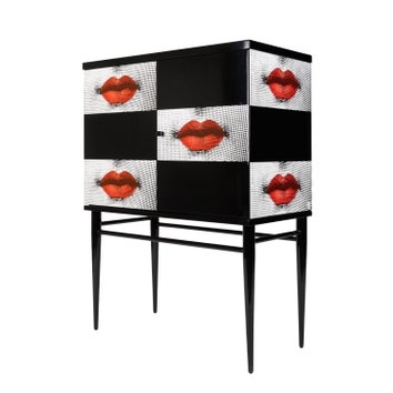 Поцелуй от Fornasetti: новая коллекция мебели и аксессуаров