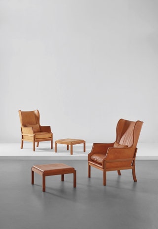 Mogens Koch Pair of Wingback Armchairs and Ottomans.