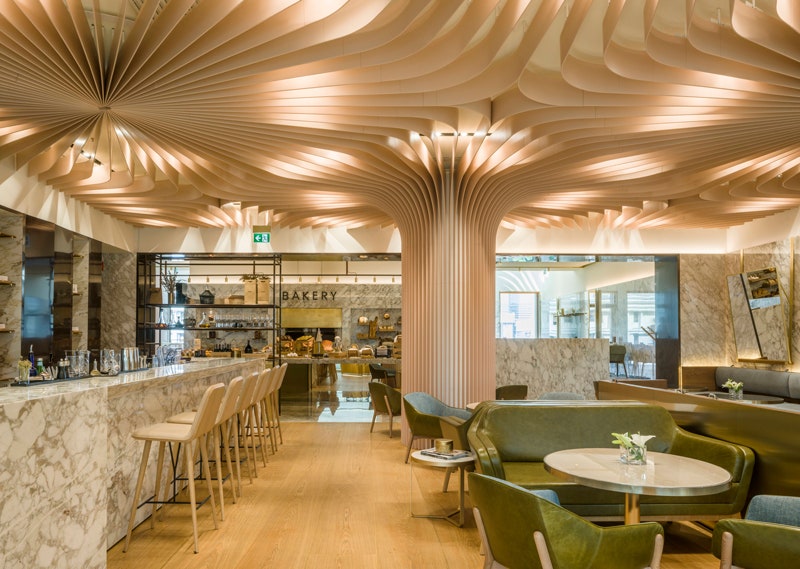 Ресторан Mökki в Астане в отеле The RitzCarlton фото интерьеров от лондонской студии Blacksheep