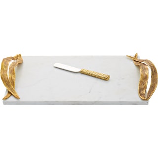 Доска и нож для нарезки сыра из кол­лекции Palm Michael Aram.