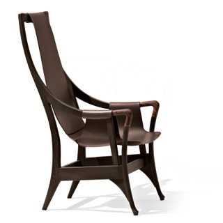 Кресло Pure из коллекции Progetti по дизайну Умберто Аснаго в 2017 году было выпущено ограниченным тиражом.
