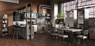 Кухня Industrial Giulia Novars. Гобразная форма и единство материалов всей мебели обозначают зону столовой и кухни...