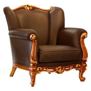Классическое кожаное кресло в обивке шоколадного цвета хорошо будет смотреться в кабинете ArteArredo | www.artearredo.net.