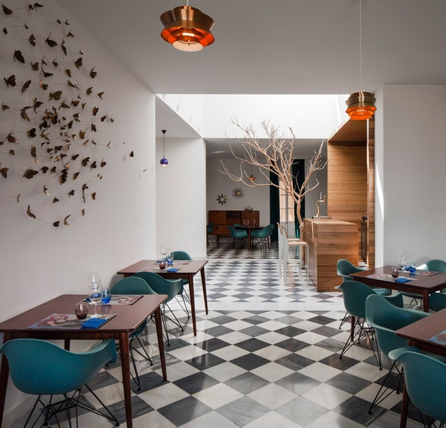 Ресторан El Tragaluz в Испании интерьеры после возвращения зданию исторического облика | Admagazine