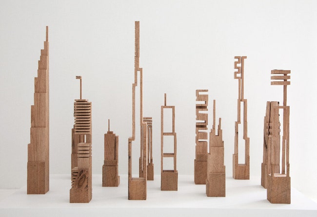 Metros урбанистические скульптуры Джеймса Макнаба и мебель из деревянных небоскребов | Admagazine