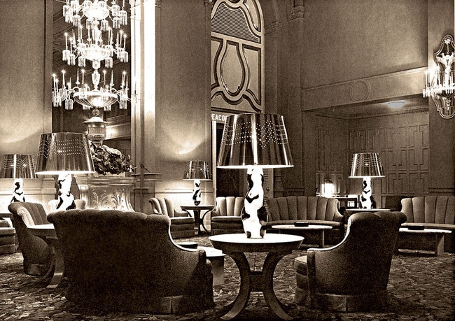 Салон отеля Mark Hopkins в СанФранциско . Ковер и диваны в комнате были красные кресла синие а лампы золотые.