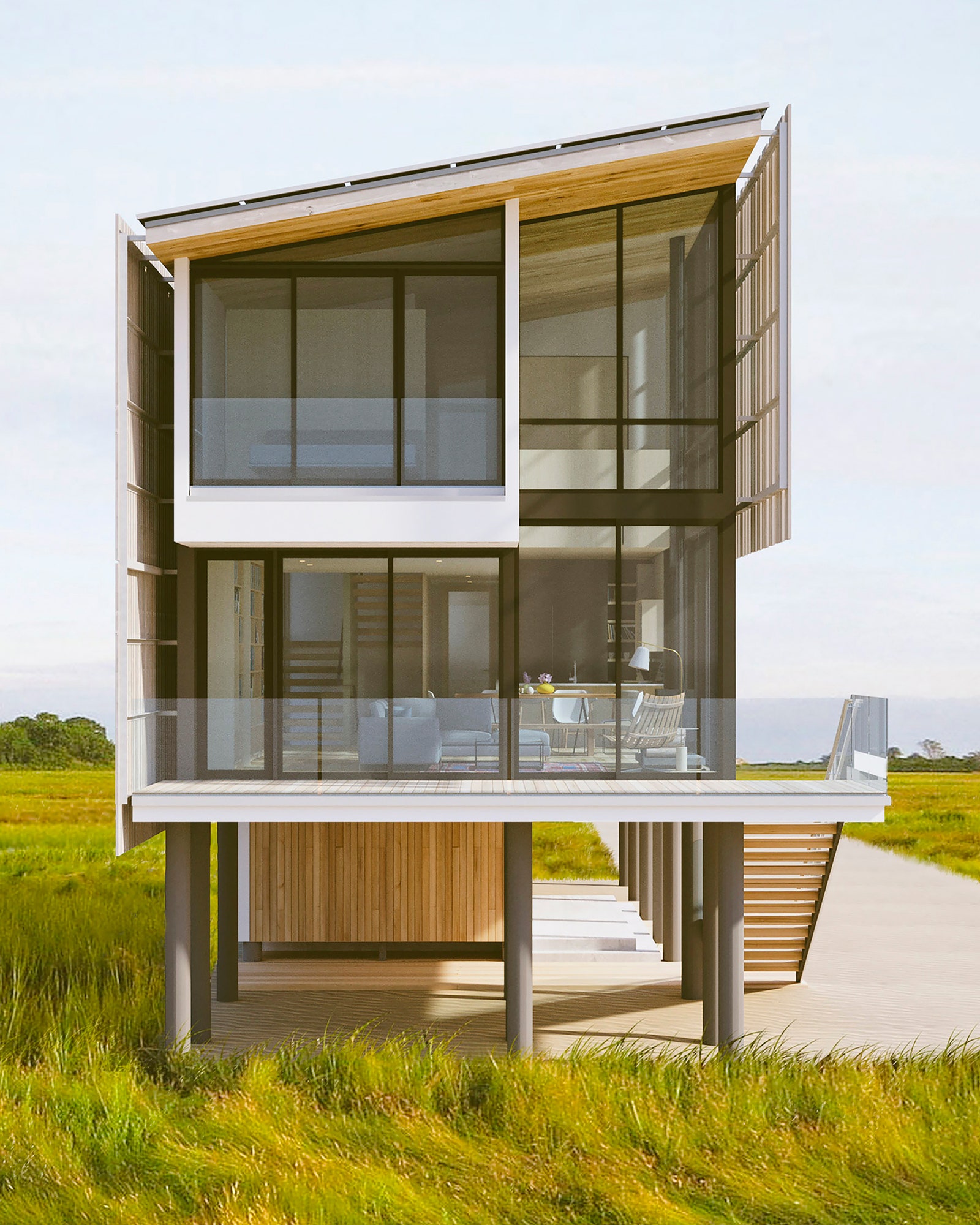 A modern waterfront house sited directly on the edge of the Barnegat Bay.